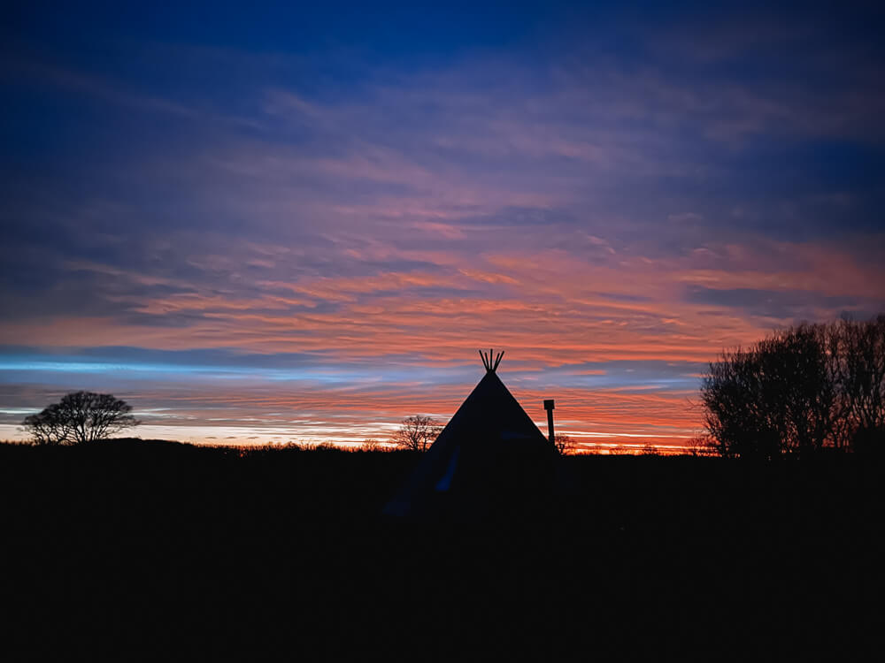 Brick Kiln Barn Tipi at sunset
